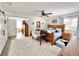 Bright and airy main bedroom with a decorative rug and an ensuite bath access at 1330 Belcher Dr, Tarpon Springs, FL 34689