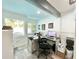 Bright home office with work space and large window with a view at 1330 Belcher Dr, Tarpon Springs, FL 34689