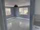 Bright living room with natural light and tile flooring at 13314 Lisa Dr, Hudson, FL 34667