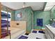 Spacious bathroom features bathtub, stand up shower, and large vanity with plenty of space at 14168 Fennsbury Dr, Tampa, FL 33624