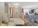 Bright entryway showcasing tile flooring, paneled doors, and a glimpse into the dining area at 14168 Fennsbury Dr, Tampa, FL 33624