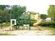 Community playground featuring slides, climbing structures, and play areas for children at 14667 Pine Glen Crk # 14667, Lutz, FL 33559