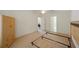 Bedroom featuring a ceiling fan, neutral carpet, and storage at 15006 Shaw Rd, Tampa, FL 33625