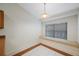 Cozy breakfast nook with built-in seating and a large window overlooking the yard at 15006 Shaw Rd, Tampa, FL 33625