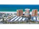 Aerial view of condos, beach and parking showing proximity to the ocean at 17900 Gulf Blvd # 16C, Redington Shores, FL 33708