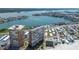 Expansive aerial view of waterfront condos near bay and residential neighborhood at 17900 Gulf Blvd # 16C, Redington Shores, FL 33708
