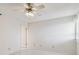 Bright bedroom featuring tiled flooring, a ceiling fan, and neutral wall color at 17900 Gulf Blvd # 16C, Redington Shores, FL 33708