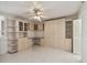 This bedroom features custom built-ins and a ceiling fan at 17900 Gulf Blvd # 16C, Redington Shores, FL 33708