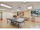 Game room featuring a ping pong table with beach and palm tree views at 17900 Gulf Blvd # 16C, Redington Shores, FL 33708