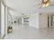 Spacious living room featuring tile floors, mirrors and sliders to the ocean view at 17900 Gulf Blvd # 16C, Redington Shores, FL 33708