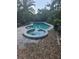 Sparkling pool and jacuzzi combination, ideal for relaxation and recreation at 1831 Pasadena Dr, Dunedin, FL 34698