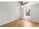 Small bedroom with wood floors and a ceiling fan at 2032 Sunset Meadow Dr, Clearwater, FL 33763