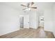 Bright bedroom featuring wood-look floors and easy access to kitchen and bathroom at 2220 3Rd E Ave, Bradenton, FL 34208