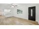 Bright living space featuring a modern kitchen and stylish entryway at 2220 3Rd E Ave, Bradenton, FL 34208