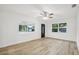 Sun-filled living room with large windows showcasing the exterior view at 2220 3Rd E Ave, Bradenton, FL 34208