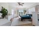 Bright Primary bedroom with large windows and an en-suite bathroom at 230 Columbia Dr, Tampa, FL 33606