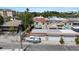 Well-maintained multi-Gathering building with attached garages, surrounded by lush greenery and a parked boat at 230 Columbia Dr, Tampa, FL 33606
