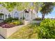 Attractive front yard with well-maintained landscaping, creating a welcoming atmosphere at 230 Columbia Dr, Tampa, FL 33606