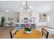Open concept kitchen with a large island and decorative lighting at 230 Columbia Dr, Tampa, FL 33606