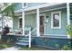 Quaint single-story home with a covered porch and lovely curb appeal at 2320 E 12Th Ave, Tampa, FL 33605