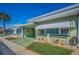 Inviting single-story home with a covered carport and a delightful garden bed at 250 Rosery Nw Rd # 218, Largo, FL 33770