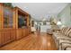 Spacious living room with an open floor plan and hardwood floors leading to the kitchen at 250 Rosery Nw Rd # 218, Largo, FL 33770