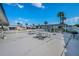 Community picnic area with multiple tables and grills, ideal for outdoor gatherings and cookouts at 250 Rosery Nw Rd # 218, Largo, FL 33770