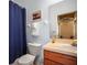 Bright bathroom features a vanity with sink and toilet at 31108 Whitlock Dr, Wesley Chapel, FL 33543