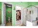 Bathroom with shower, toilet, and walk-in closet access at 31108 Whitlock Dr, Wesley Chapel, FL 33543