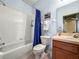 Bright bathroom featuring a vanity with sink and toilet at 31108 Whitlock Dr, Wesley Chapel, FL 33543