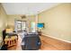 Cozy living room with sliding door access to lanai at 31108 Whitlock Dr, Wesley Chapel, FL 33543