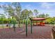 Playground with swings, slides, and climbing structures for Gathering enjoyment at 31108 Whitlock Dr, Wesley Chapel, FL 33543
