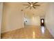 Inviting living room with neutral walls, tile floor, and contemporary lighting fixture at 3201 Pine Top Dr, Valrico, FL 33594