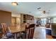 Spacious living area with hardwood floors, fireplace feature, and large windows at 34389 Orchid Pkwy, Ridge Manor, FL 33523