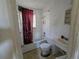 Bathroom showcases a tub, toilet, vanity, and natural light at 3720 12Th S Ave, St Petersburg, FL 33711