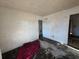 Vacant bedroom features worn walls, flooring, and natural light at 3720 12Th S Ave, St Petersburg, FL 33711
