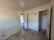 Vacant bedroom offers worn walls, flooring, and minimal natural light at 3720 12Th S Ave, St Petersburg, FL 33711