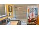 Charming bathroom featuring a granite-top vanity, a shower and floral shower curtain at 406 2Nd Sw St, Ruskin, FL 33570