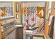 Bathroom features a modern sink, granite countertop, a mirror and a vanity at 406 2Nd Sw St, Ruskin, FL 33570