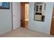 Cozy bedroom with hardwood floors viewed from an adjacent room at 406 2Nd Sw St, Ruskin, FL 33570