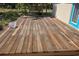 A spacious wooden deck adds extra space for entertaining and relaxing just outside the house at 406 2Nd Sw St, Ruskin, FL 33570