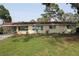 Charming one-story home featuring a carport and well-maintained landscaping at 406 2Nd Sw St, Ruskin, FL 33570