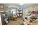 Spacious garage with shelving, laundry machines, ample storage, and concrete block wall at 406 2Nd Sw St, Ruskin, FL 33570