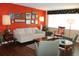 Bright living room with hardwood floors, modern furniture, and neutral decor at 406 2Nd Sw St, Ruskin, FL 33570