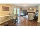 Comfortable living room with hardwood floors, natural light, and a cozy seating area at 406 2Nd Sw St, Ruskin, FL 33570