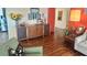 Inviting living room featuring hardwood floors, stylish furniture, and charming decor at 406 2Nd Sw St, Ruskin, FL 33570
