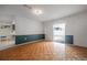 A bright living room with parquet floors and sliding door access to the yard at 4435 Sail Dr, New Port Richey, FL 34652