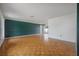 Bright living room featuring hardwood floors, and access to outdoor patio at 4435 Sail Dr, New Port Richey, FL 34652