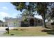 Well maintained single story home with an attached two car garage and mature landscaping at 4657 Parkway Blvd, Land O Lakes, FL 34639