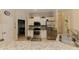 Updated kitchen featuring granite countertops, stainless steel appliances, and ample cabinet space at 4657 Parkway Blvd, Land O Lakes, FL 34639